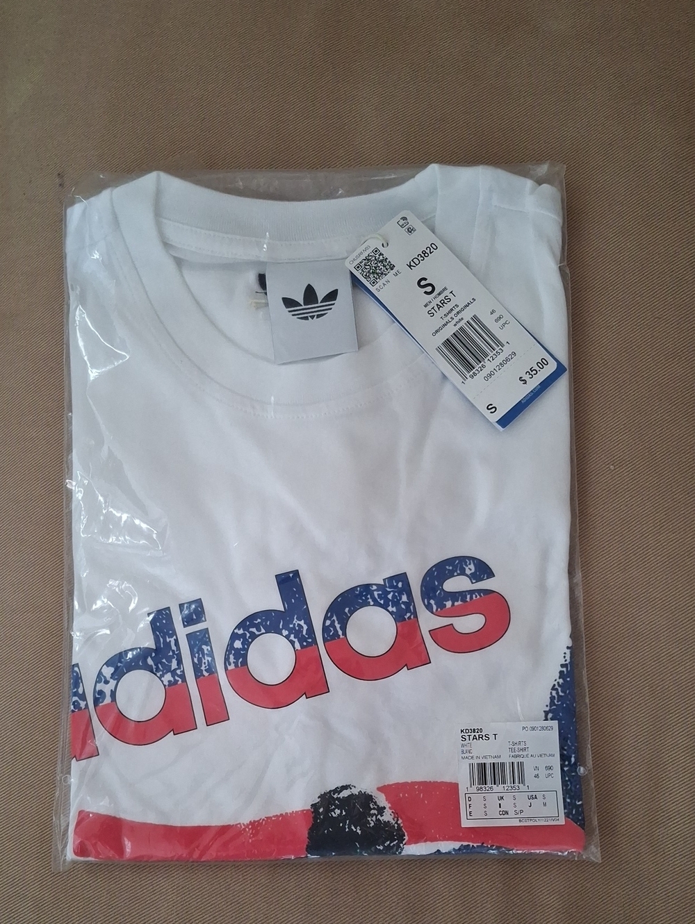 adidas White Short-Sleeve Logo Tee with Red & Blue Graphic